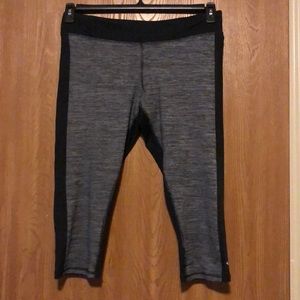 Black and gray DuoDry workout capris by Champion.
